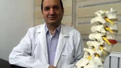 Fizik Tedavi ve Rehabilitasyon Uzmanı Prof. Dr. Turan Uslu, yatmadan